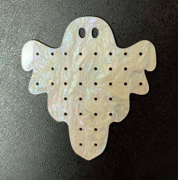 Ghost shaped earring palette in white shimmer acrylic with holes for 34 pairs of earrings